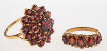 Two 9ct gold garnet rings,