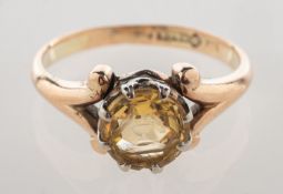 A 9ct gold citrine intaglio ring, the citrine having a carved intaglio of two birds at a bird bath,