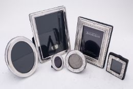 A mixed group of Elizabeth II silver photograph frames including; various dates and makers,