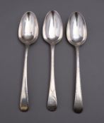 A pair George III Bright-cut table spoons probably by Stephen Adams I,