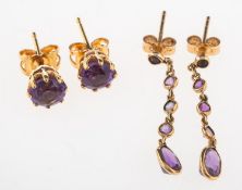 Two pairs of amethyst set earrings, including a pair of stud earrings,
