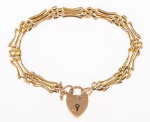 A gate bracelet with heart padlock, safety chain, heart padlock UK hallmark for 9ct,