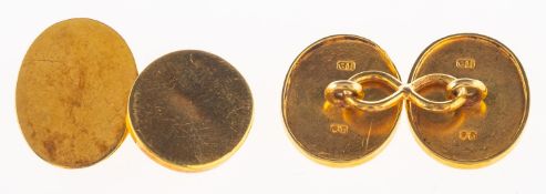 A pair of oval cufflinks, with chain link fittings, partial UK hallmark,