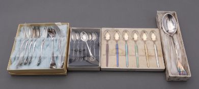 A mixed group of Danish spoons including; seven coffee spoons with pierced handles,