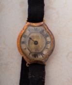 An 18ct gold lady's cocktail watch the shaped silvered dial having black Roman numerals,