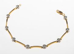 A diamond line bracelet, bi-colour and of articulated bar links,