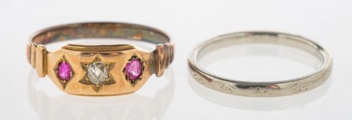 An 18ct gold wedding band and a ruby & diamond ring,