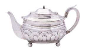 A George III silver tea pot maker's mark rubbed out, London 1814, of barge shape,