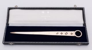 An Elizabeth II cased silver skewer paper knife by Mappin & Webb, Birmingham 1992, 22.6cm (8.5ins.