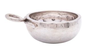 An early 19th century French silver tastevin, marks on handle, side and base,