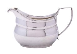 A George III silver cream jug by Thomas Johnson, London 1809,