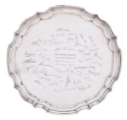 An Elizabeth II silver presentation salver by Joseph Gloster Ltd, Birmingham 1969, of circular form,
