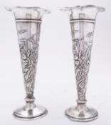 A pair of Edward VII silver trumpet vases by William Comyns, London 1903,
