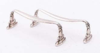 A pair of mid 20th century Danish silver knife rests by Georg Jensen, circa 1915-1930,