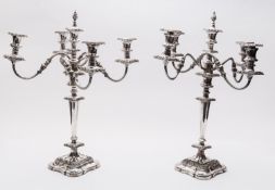 A pair of early 20th century silver plated four branch candelabra, unmarked,