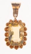 A citrine pendant, claw set with a rectangular-cut citrine, citrine approx. 15.