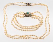 A pearl necklace and a pearl bracelet, a double row graduated cultured pearl necklace,