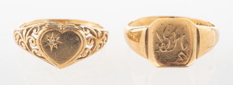 Two signet rings, including a heart-shaped signet ring,