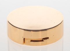 A pill box, of circular form, marked 14k, diameter approx. 3.3cm, 31.0grams.