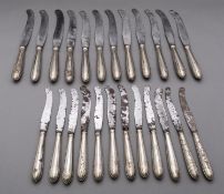A set of George III silver plated table knives with steel scimitar blades stamped Page,