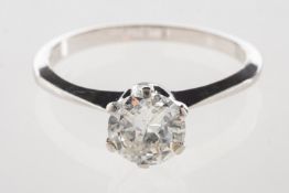A diamond solitaire ring, claw set with a transitional-cut diamond, diamond approx. 0.