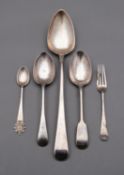A mixed group of silver flatware including;