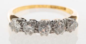 A five stone diamond ring, claw set with five older-cut diamonds, diamonds approx. 0.