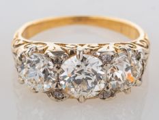 An antique diamond three stone ring, claw set with three old European-cut diamonds, diamonds approx.