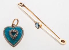 A blue topaz bar brooch and a diamond & enamel heart keepsake pendant,