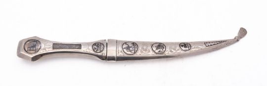 A mid 20th century Iraqi Marsh Arab Janbiya dagger, two marks on the scabbard, with a silver blade,