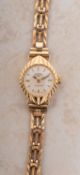 Rotary a 9ct gold lady's wristwatch the dial signed Rotary 21 Jewels with raised baton numerals and