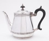 A George V silver tea pot by Walker & Hall Ltd, Sheffield 1925, of inverted tapering form,