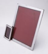 A large George V silver photograph frame by William Neale & Son, Birmingham 1927,