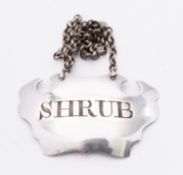 A George II silver wine label by Robert Collier, London circa 1750, shaped escutcheon form, Shrub,