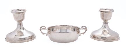 A pair of Elizabeth II dwarf silver candlesticks by Charles S Green & Co Ltd, Birmingham 1959,