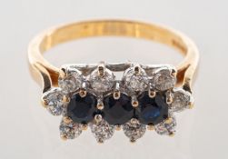 A 9ct gold sapphire cluster ring,