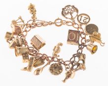 A charm bracelet with charms, a curb link charm bracelet with bolt ring closure and safety chain,