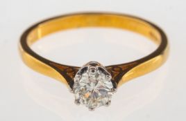 An 18ct gold diamond solitaire ring, claw set with a brilliant-cut diamond, diamond approx. 0.