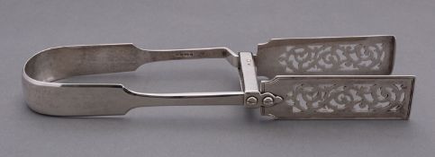 A pair of Victorian silver Fiddle pattern asparagus /serving tongs by John James Whiting,