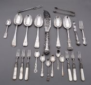 A mixed group of silver flatware including; five table spoons, various dates and makers,
