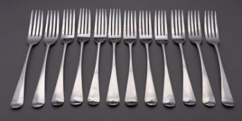 A set of twelve George III silver Hanoverian pattern table forks by George Turner, Exeter 1814,