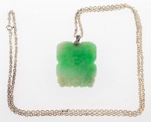 A jade pendant with chain,