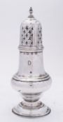 A George V silver sugar castor, maker's mark over struck, Birmingham 1891, of vase shape,