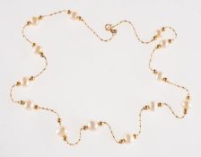 A freshwater pearl necklace, freshwater pearls interspaced by fancy-link twisted chain and beads,