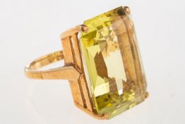 A 9ct gold cocktail ring, set with a rectangular-cut green quartz, approx. 34.
