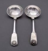 A pair of George VI silver Fiddle and Shell sauce ladles by Morris & Michael Emanuel, London 1827,