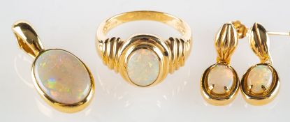 A suite of opal jewellery, including a pendant/necklace enhancer,