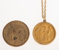 A full sovereign in pendant mount with chain and one other coin,