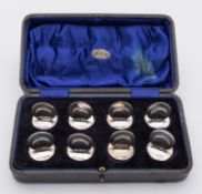 A cased set of eight Edward VII silver menu holders by Sampson Mordan & Co Ltd, Chester 1903, Rd.