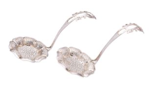 A pair of mid 19th century Dutch silver straining spoons by Bonebakker En Zoon,